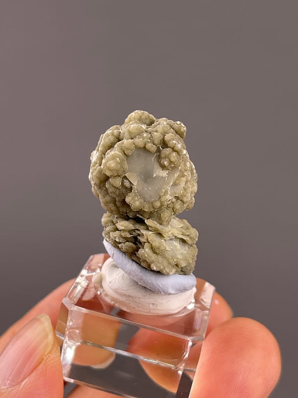 Calcite from Huanggangliang, Inner Mongolia, China: rear angle with pale center and layered lower crystals.