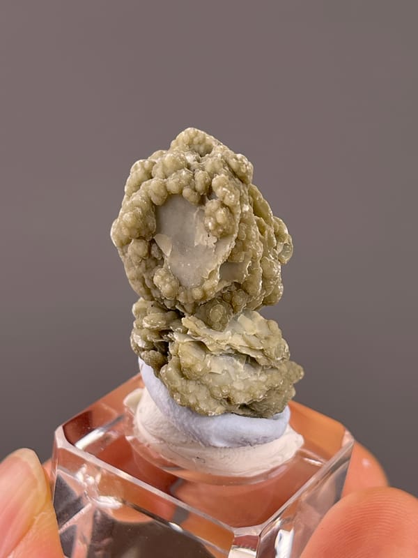 Calcite from Huanggangliang, Inner Mongolia, China: oblique reverse showing ridged green margins.
