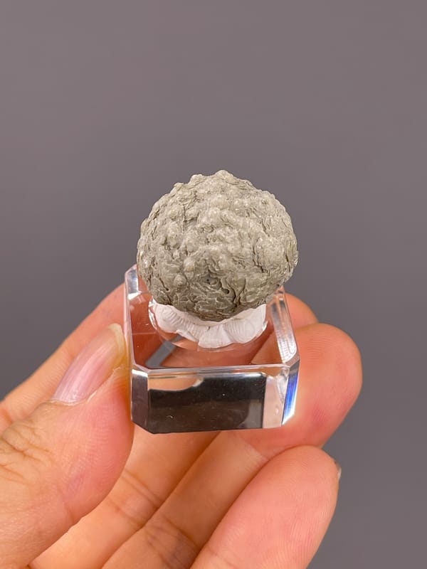 Calcite from Huanggangliang, Inner Mongolia, China: side view of the rounded pale green aggregate.