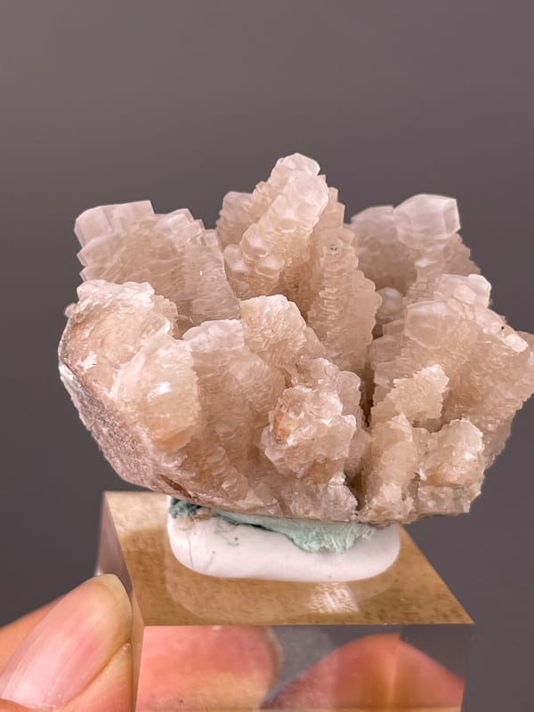Calcite specimen from Longyan, Fujian, China, defined by peach stacked calcite crystals