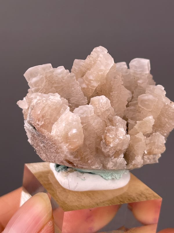 Calcite specimen from Longyan, Fujian, China presenting peach stacked calcite crystals