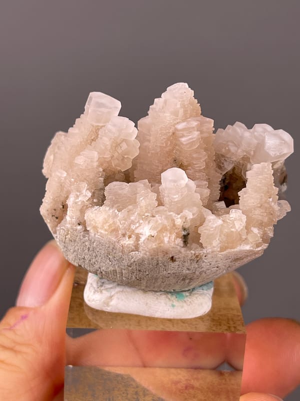 Calcite specimen from Longyan, Fujian, China highlighting peach stacked calcite crystals