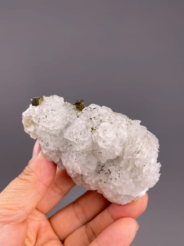 Calcite from Longyan, Fujian, China: horizontal view showing pale overlapping plate edges.