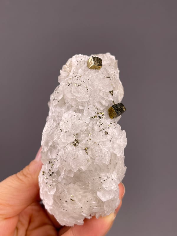 Calcite from Longyan, Fujian, China: upright full view of the uneven pale outline.