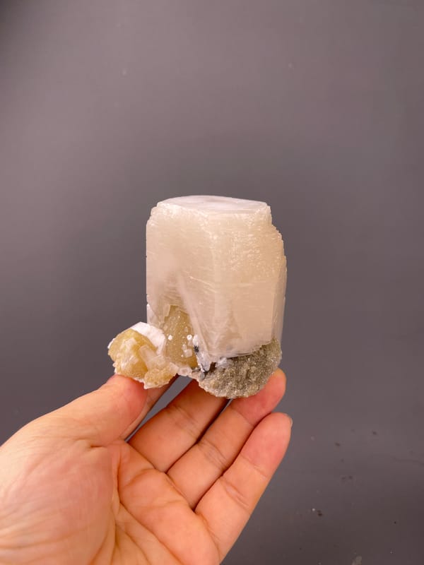 Calcite specimen from Fujian, China featuring off-white cleaved prismatic crystal