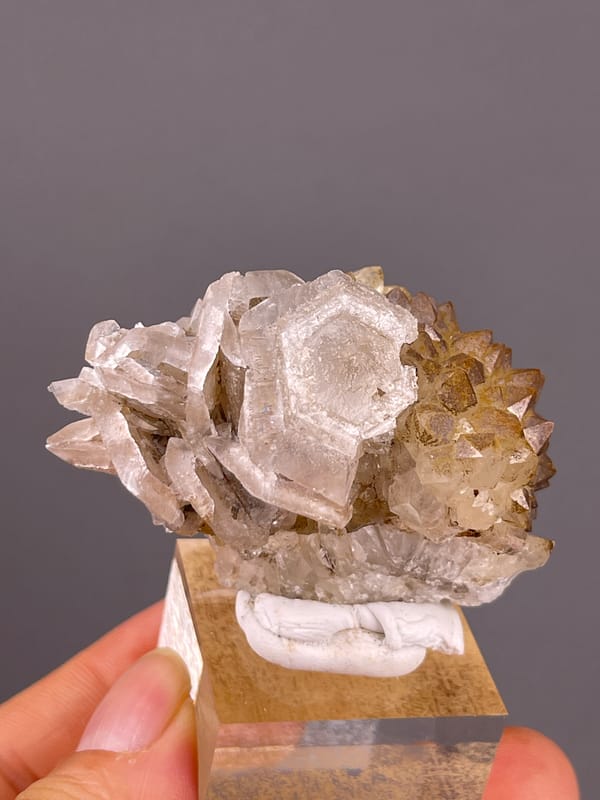 Calcite with Quartz specimen from Longyan, Fujian, China presenting cream tabular rosette blades