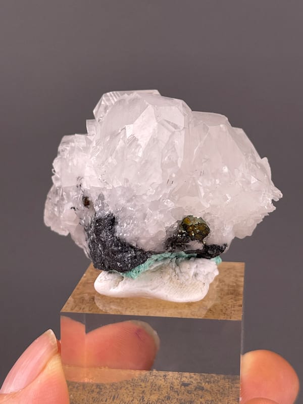 Calcite specimen from Longyan, Fujian, China, defined by clear calcite cluster over dark matrix
