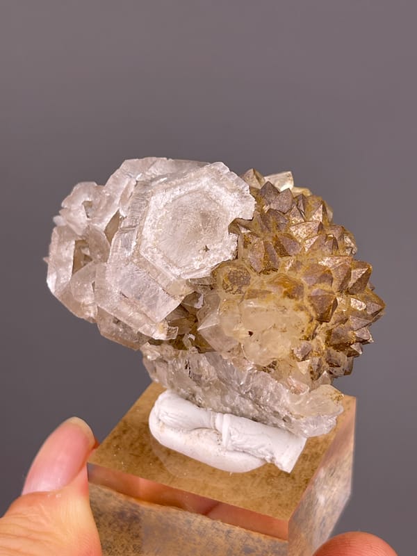 Calcite with Quartz specimen from Longyan, Fujian, China displaying cream tabular rosette blades