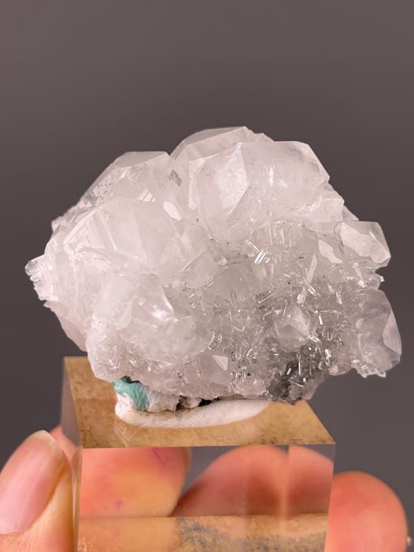 Calcite specimen from Longyan, Fujian, China displaying clear calcite cluster over dark matrix