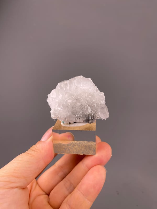 Calcite specimen from Longyan, Fujian, China, characterized by clear calcite cluster over dark matrix