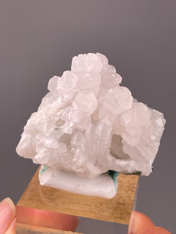 Calcite specimen from Longyan, Fujian, China bearing pale pink blocky calcite cluster