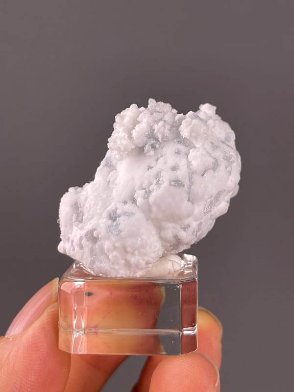 Celestine specimen from Yunnan, China featuring white botryoidal crystalline coating