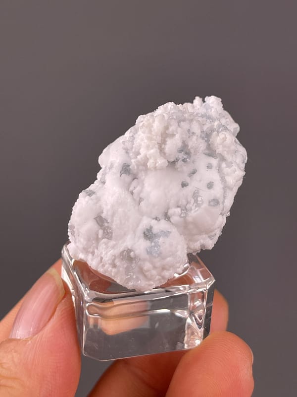 Celestine specimen from Yunnan, China, defined by white botryoidal crystalline coating
