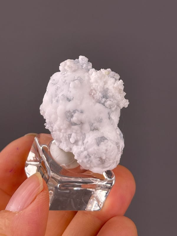 Celestine specimen from Yunnan, China displaying white botryoidal crystalline coating