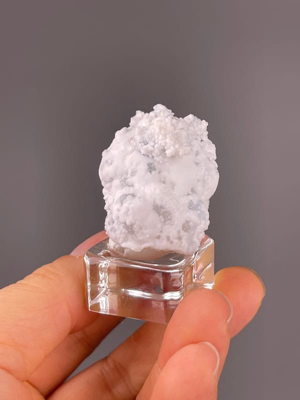 Celestine specimen from Yunnan, China highlighting white botryoidal crystalline coating