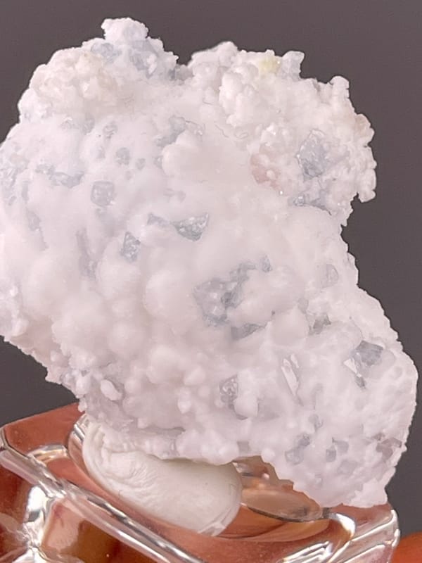 Celestine specimen from Yunnan, China bearing white botryoidal crystalline coating