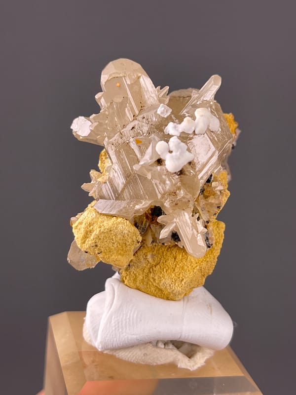 Cerussite specimen from Iran featuring colorless striated prisms