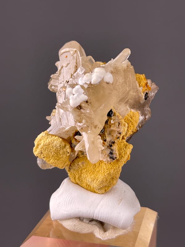 Cerussite specimen from Iran, defined by colorless striated prisms