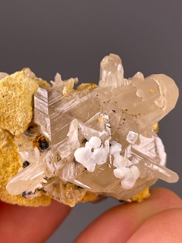 Cerussite specimen from Iran, characterized by colorless striated prisms