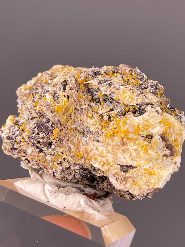 Chabazite specimen from Fujian, China, dark blades with yellow-orange coating