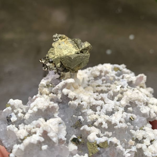 Brassy chalcopyrite crystal on white dolomite and quartz from Jiangxi, China, view 3 of 6