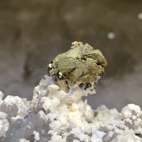 Brassy chalcopyrite crystal on white dolomite and quartz from Jiangxi, China, view 4 of 6