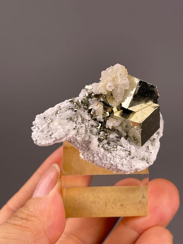 Chalcopyrite from Shangbao, Hunan, China: close rear view of the pale crystalline coating.