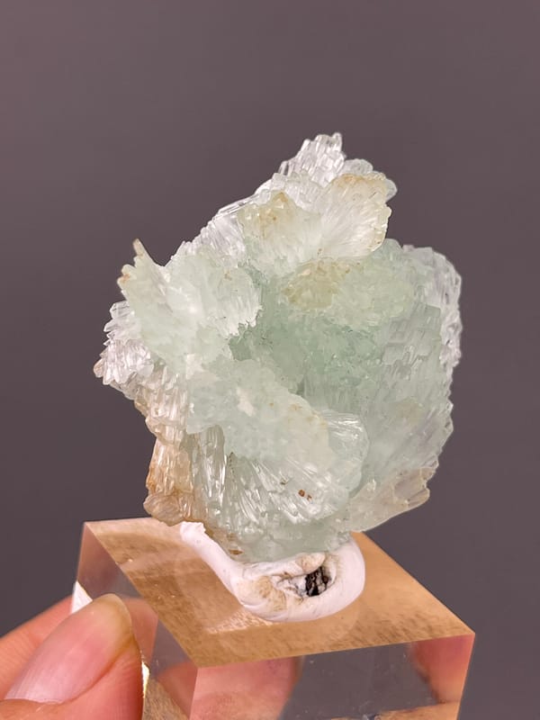 Clustered Blue Aragonite specimen from Yunnan, China presenting pale green radiating fan cluster