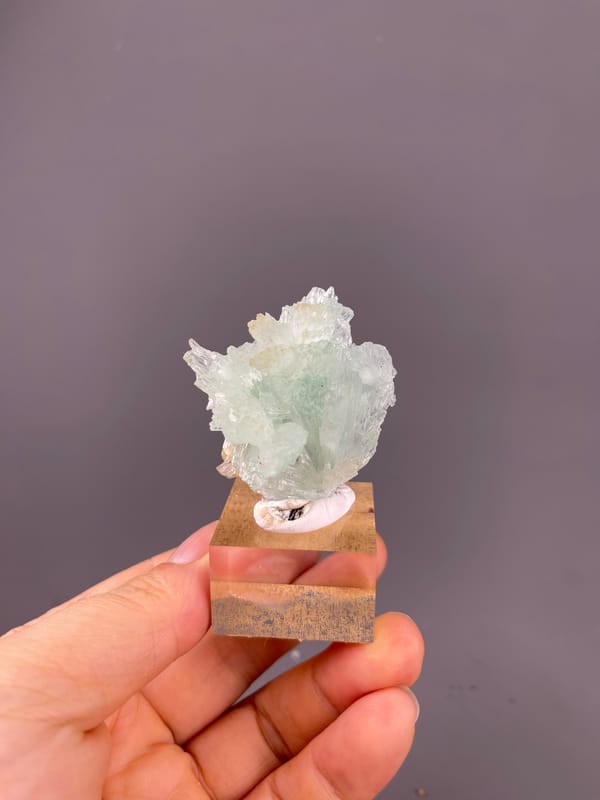 Pale green radiating fan cluster on natural clustered blue aragonite specimen from Yunnan, China