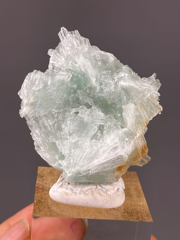 Clustered Blue Aragonite specimen from Yunnan, China highlighting pale green radiating fan cluster