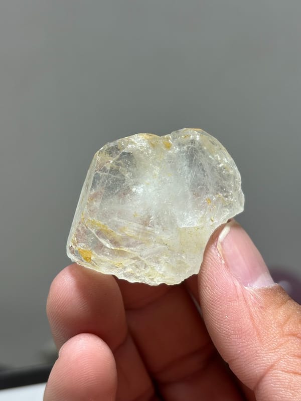 Colourless aquamarine crystal with golden staining from Xuebaoding, Sichuan, China, view 2 of 5