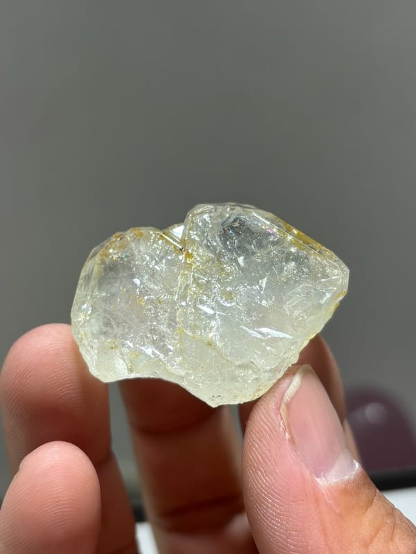 Colourless aquamarine crystal with golden staining from Xuebaoding, Sichuan, China, view 4 of 5