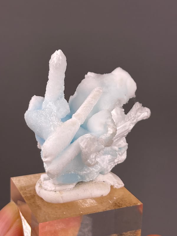 Blue Aragonite specimen from Yunnan, China, defined by pale blue and white columns