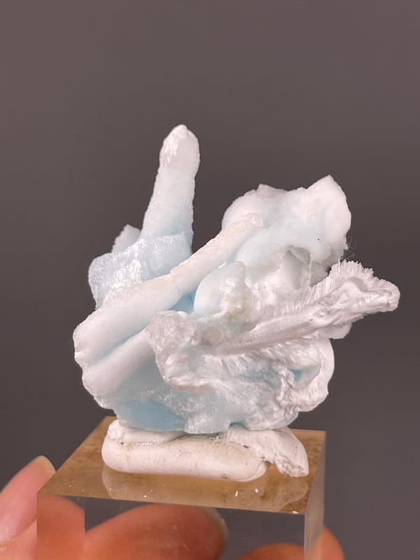 Pale blue and white columns visible on blue aragonite specimen from Yunnan, China