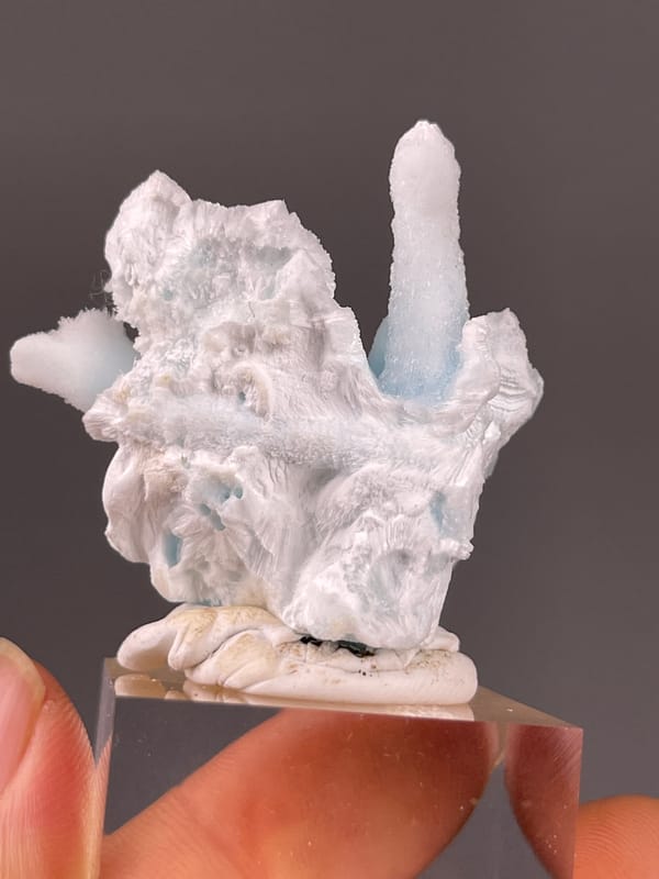 Pale blue and white columns on natural blue aragonite specimen from Yunnan, China