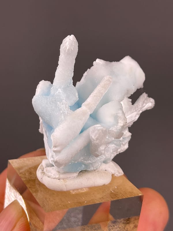 Blue Aragonite specimen from Yunnan, China, characterized by pale blue and white columns