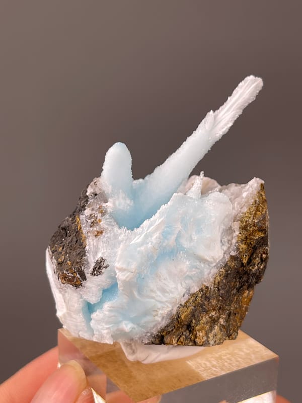Pale blue columns on matrix visible on blue aragonite specimen from Yunnan, China