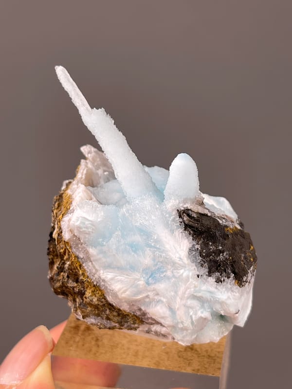 Pale blue columns on matrix on natural blue aragonite specimen from Yunnan, China