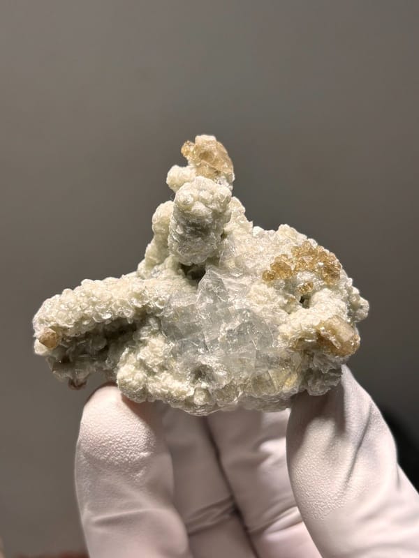 Cream scheelite and mica cluster with fluorite from Xuebaoding, Sichuan, China