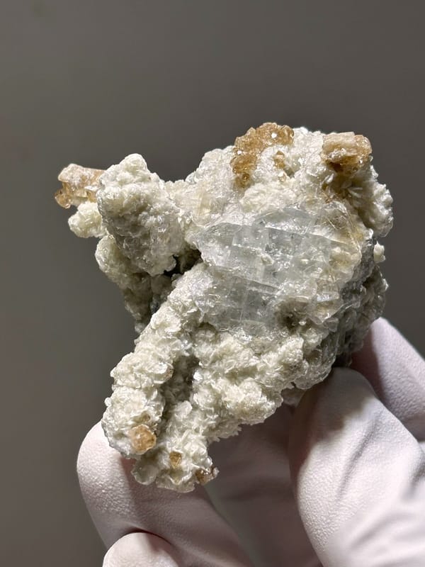 Cream scheelite and mica cluster with fluorite from Xuebaoding, Sichuan, China, view 6 of 7