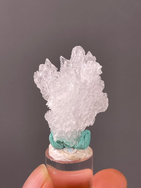 Creedite specimen from Qinglong, Guizhou, China featuring colorless radiating prismatic cluster