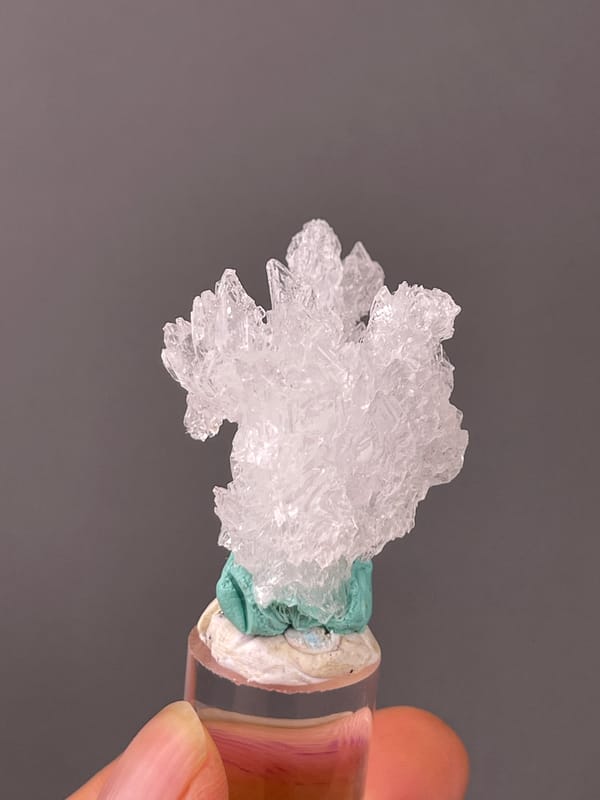 Creedite specimen from Qinglong, Guizhou, China showing colorless radiating prismatic cluster