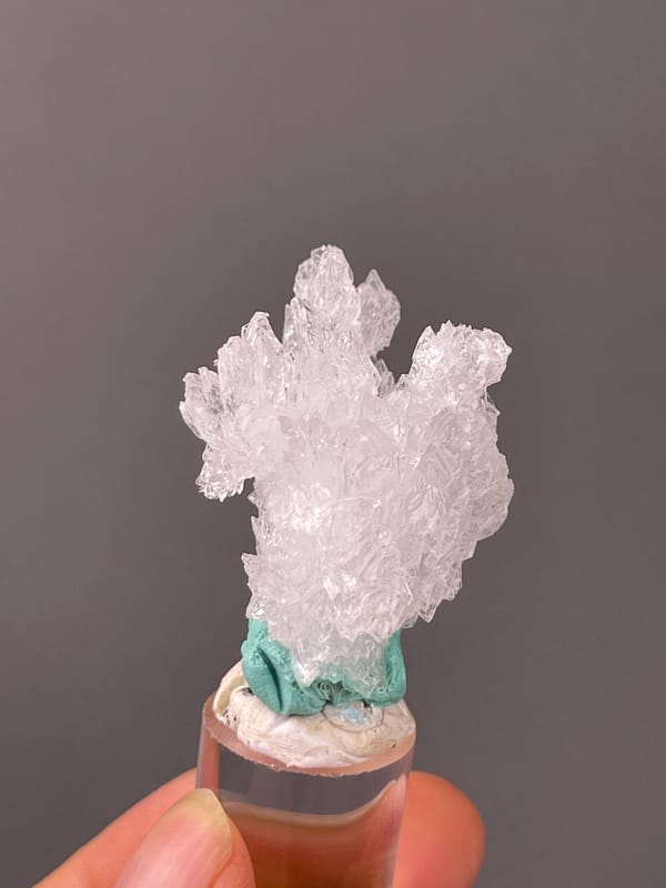 Creedite specimen from Qinglong, Guizhou, China, defined by colorless radiating prismatic cluster