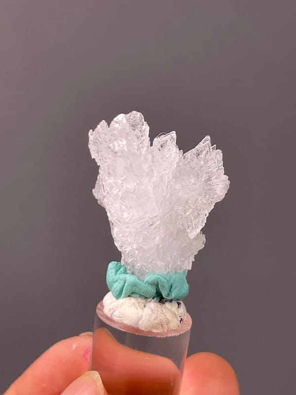 Creedite specimen from Qinglong, Guizhou, China displaying colorless radiating prismatic cluster