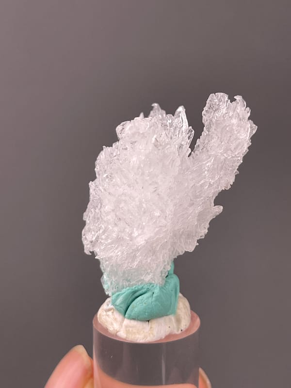 Colorless radiating prismatic cluster on natural creedite specimen from Qinglong, Guizhou, China
