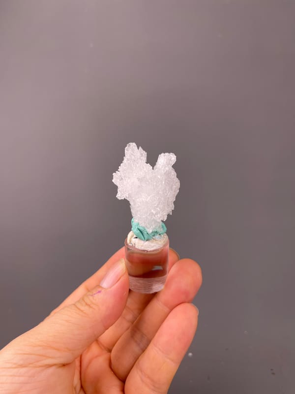 Creedite specimen from Qinglong, Guizhou, China, characterized by colorless radiating prismatic cluster