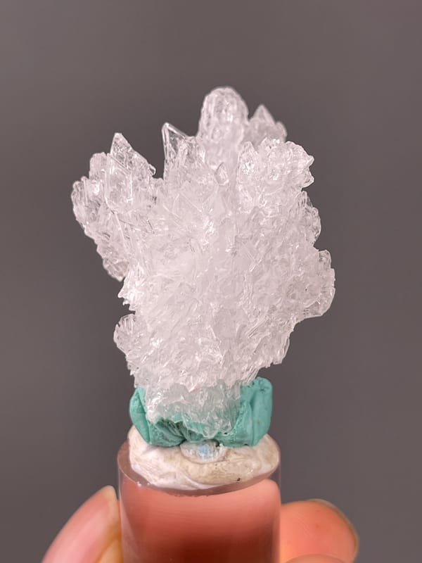 Creedite specimen from Qinglong, Guizhou, China showcasing colorless radiating prismatic cluster