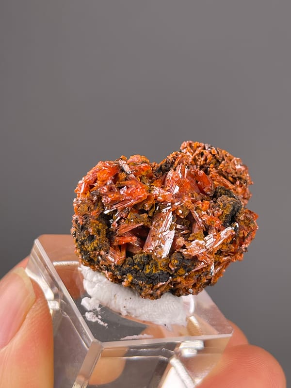 Orange-red lustrous blades visible on crocoite specimen from Australia