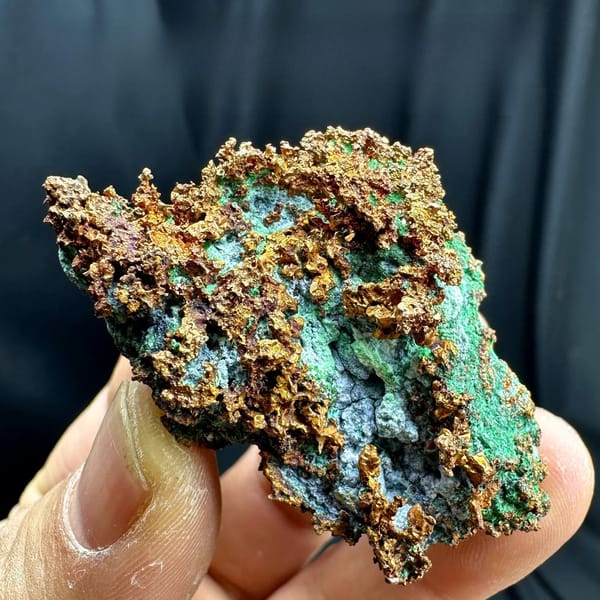 Native copper mass with green malachite and blue chrysocolla from the USA