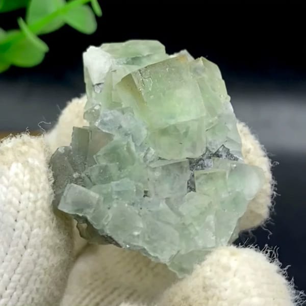 Pale green fluorite cubes with dark sulfide base from Hunan, China
